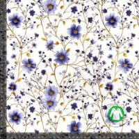 Jerseyprint med gyldne lilla blomster
