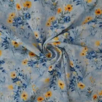 Bomulds broderi med flotte blomster i blå