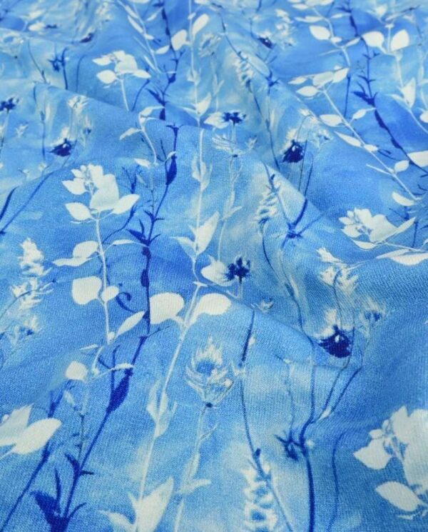 French Terry print med blomster - blå