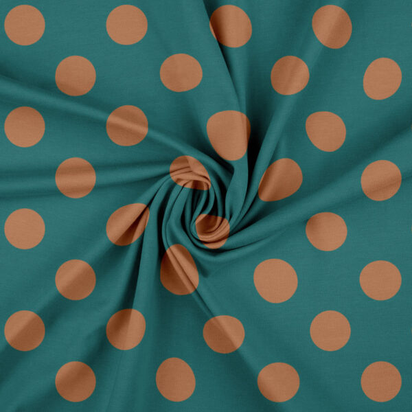 Jersey print med terracotta prikker på petrol