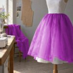 Overskørt af organza i magenta på en kjole